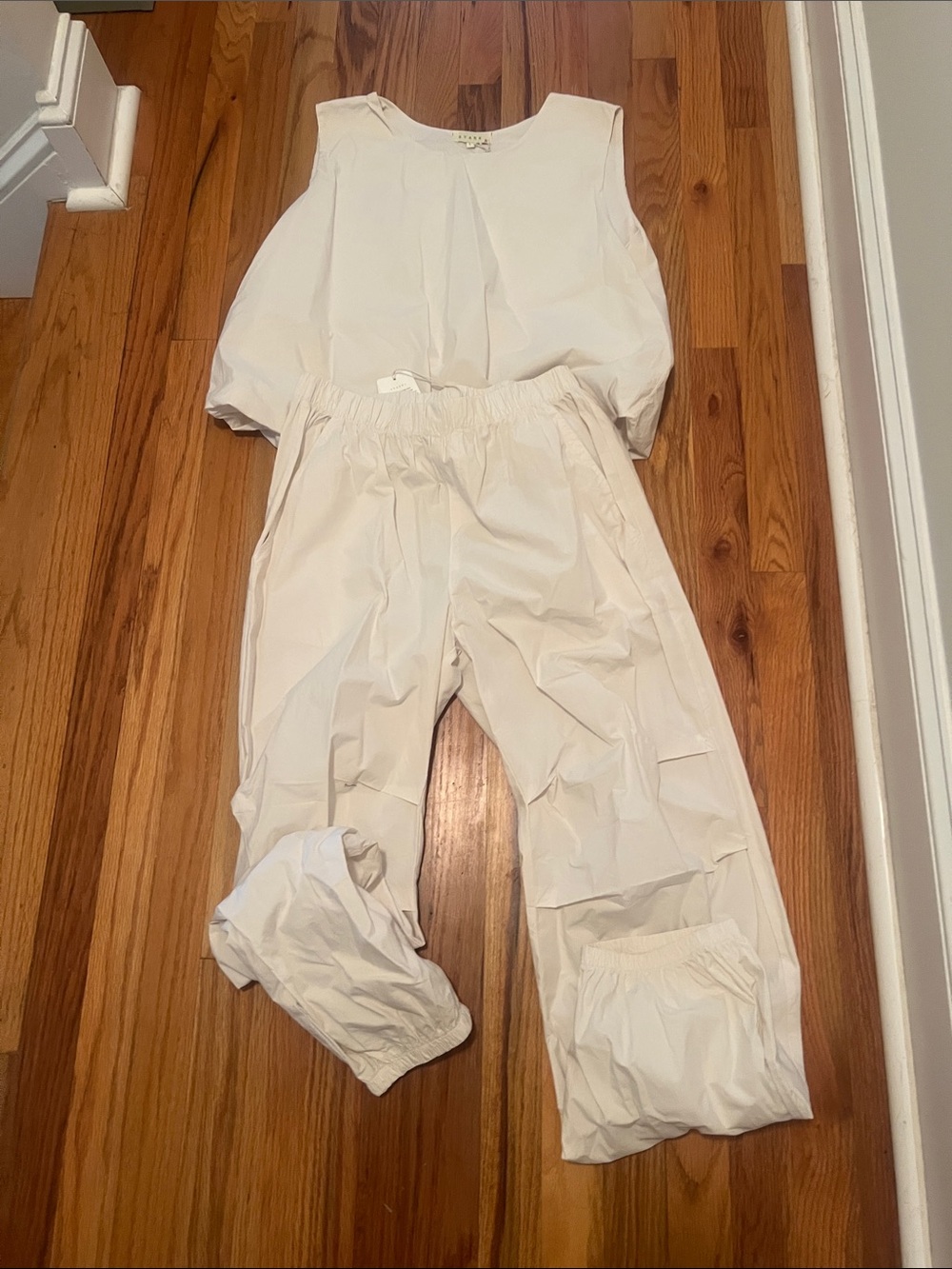 Sleeveless Cream Romper with Elastic Waistband